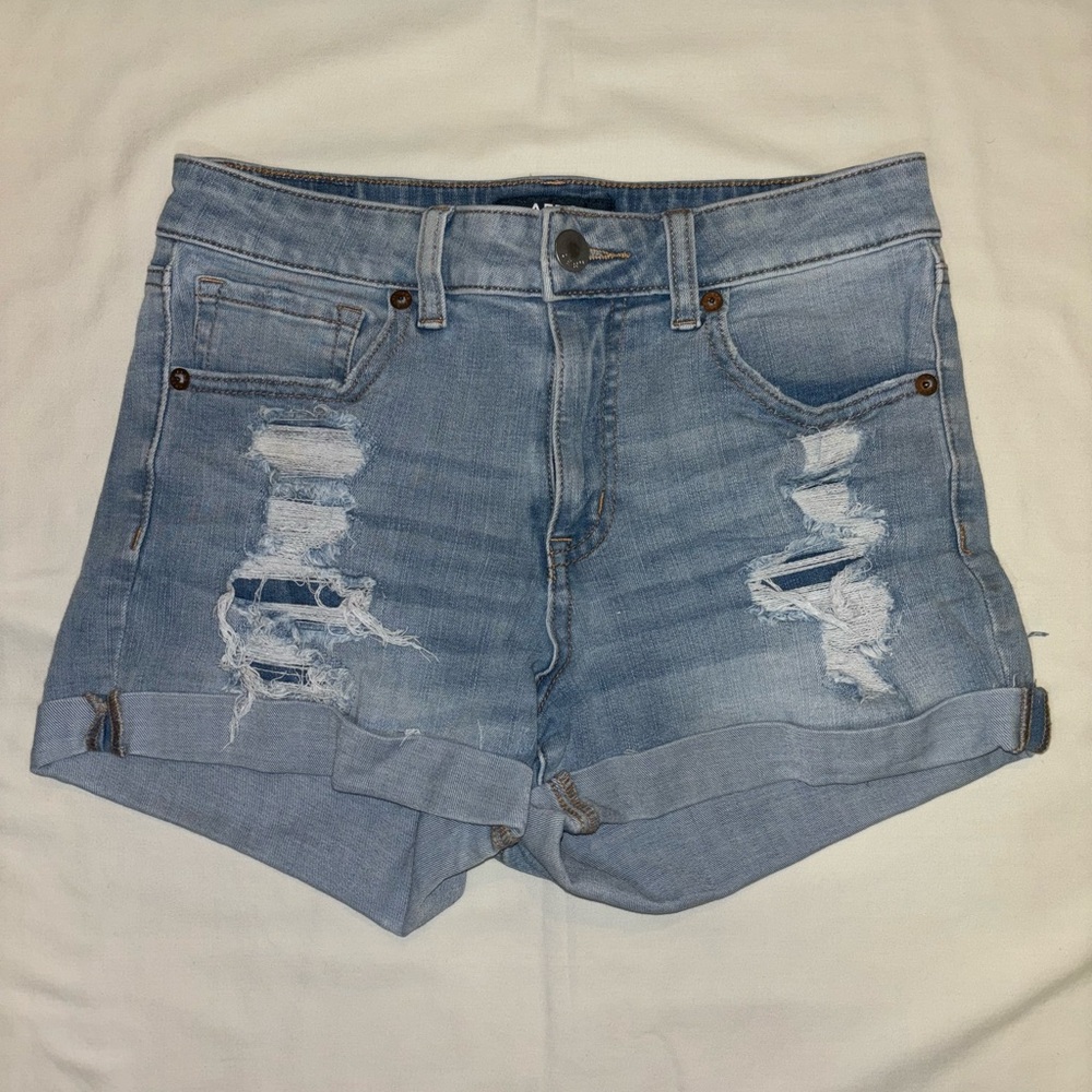 Blue ripped shorts